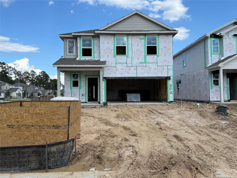 Exterior details and patio area of a home in Lakes at Black Oak, Magnolia (Image 2).