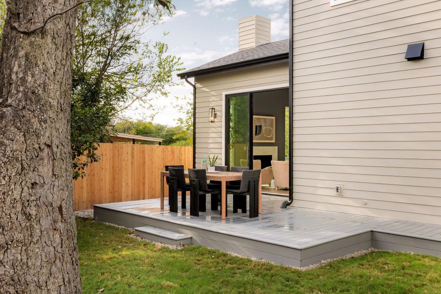 Wooden deck with outdoor dining space Wooden deck with outdoor dining space