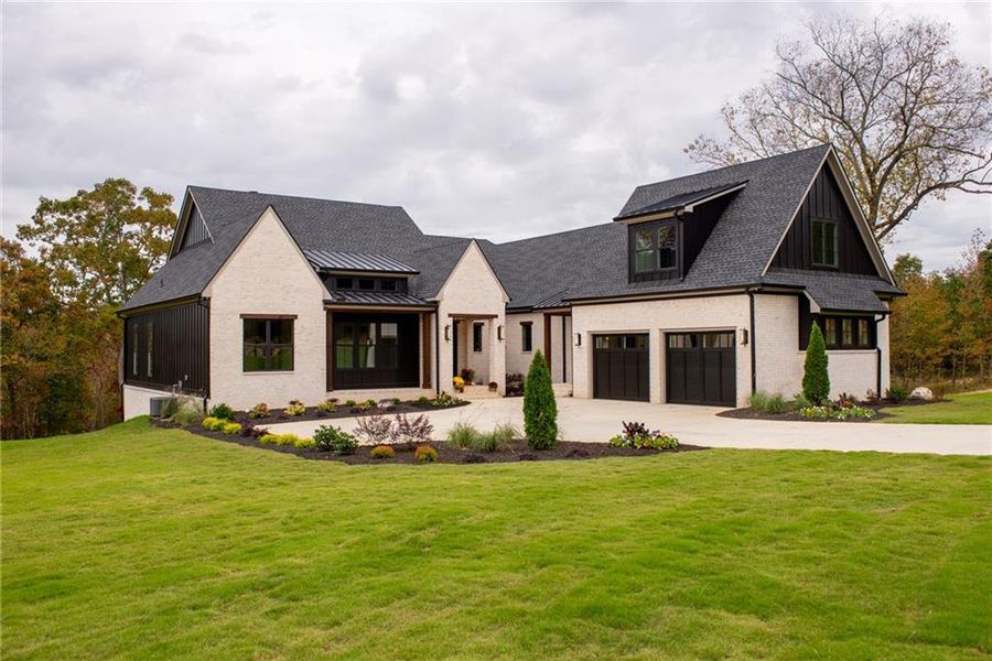 Front exterior of a new home in , Taylorsville, GA, highlighting curb appeal (Image 37). Front exterior of a new home in , Taylorsville, GA, highlighting curb appeal (Image 37).