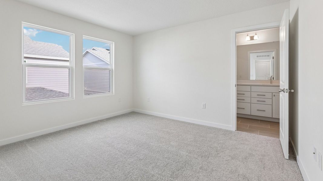 Furnished interior view inside a new home in Cyrene at Harmony, St. Cloud (Image 27).