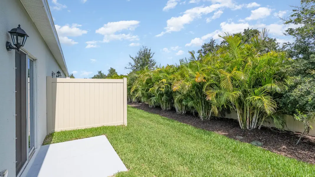 Exterior details and patio area of a home in Orchid Reserve, Sebastian (Image 3).