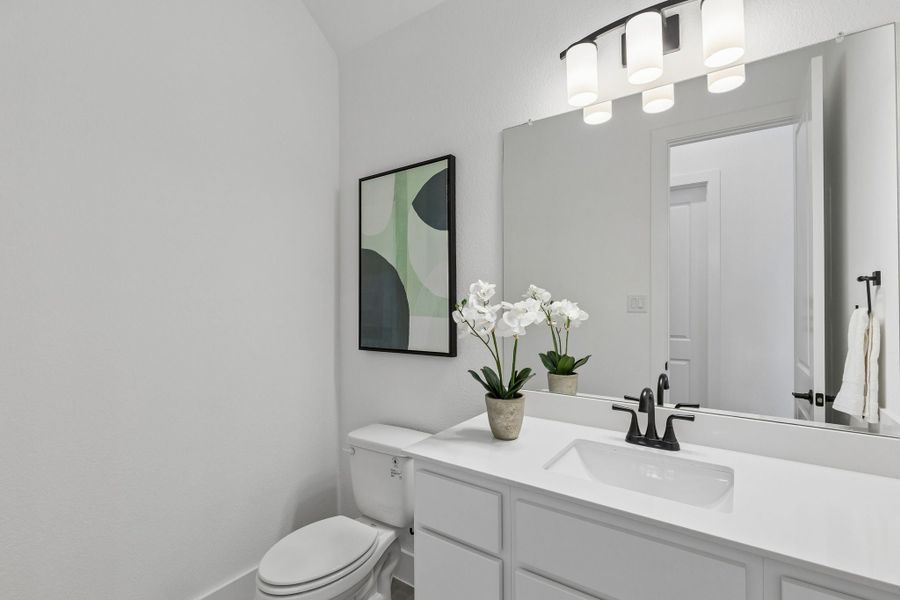 Representative furnished interior of a home built from the Roosevelt by Centre Living Homes in Newman Village Townhomes, Frisco (Image 30).