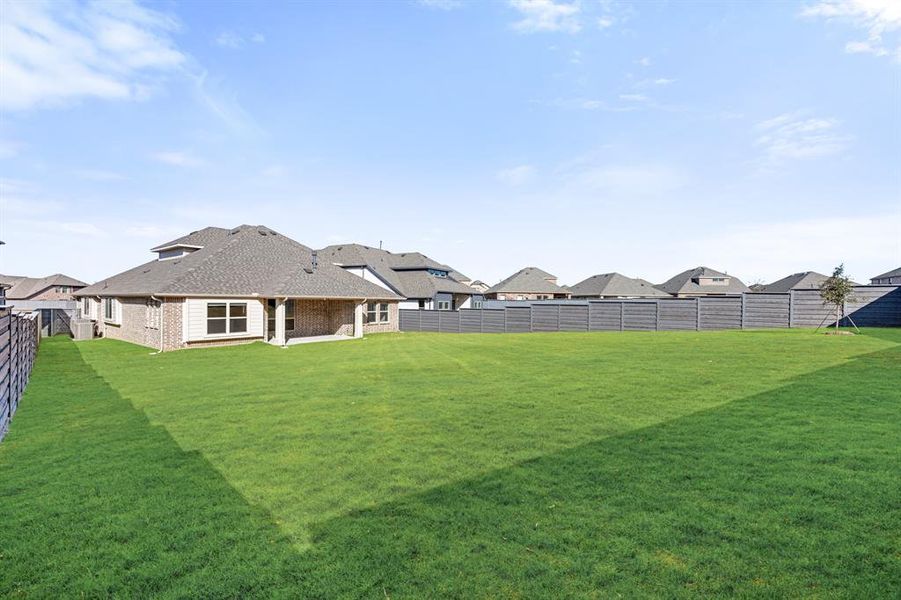 Exterior details and patio area of a home in Union Park Classic 55, Little Elm (Image 25).