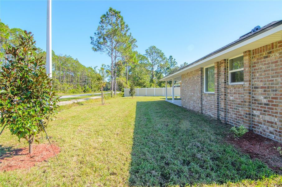 Exterior details and patio area of a home in Palm Coast, Palm Coast (Image 24).
