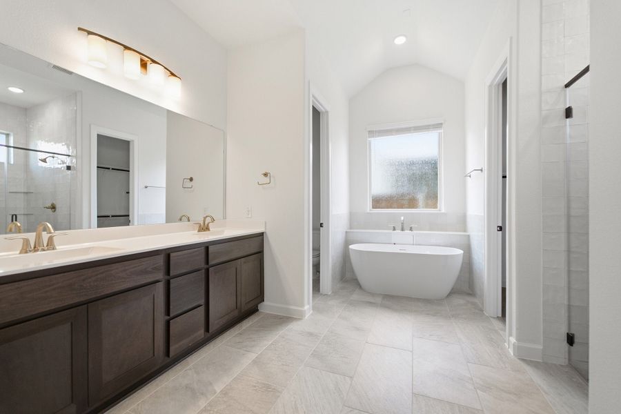 Furnished interior view inside a new home in Green Meadows, Celina (Image 12).