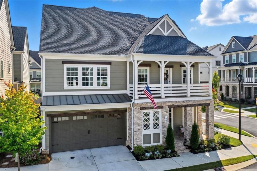 Front exterior of a new home in , Woodstock, GA, highlighting curb appeal (Image 2).