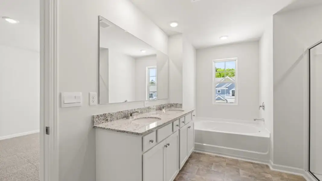Furnished interior view inside a new home in Parkside at Carter Grove, Cartersville (Image 12).