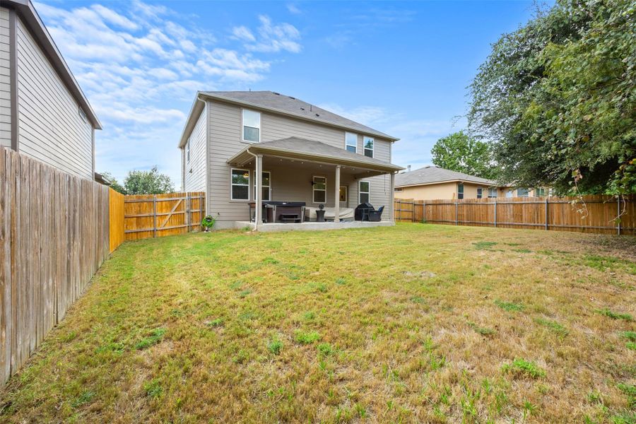 Front exterior of a new home in Stonewall Ranch 50s, Liberty Hill, TX, highlighting curb appeal (Image 1).
