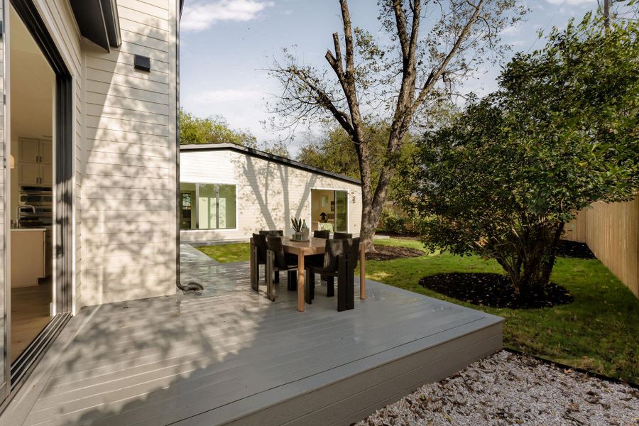Wooden deck with outdoor dining space Wooden deck with outdoor dining space