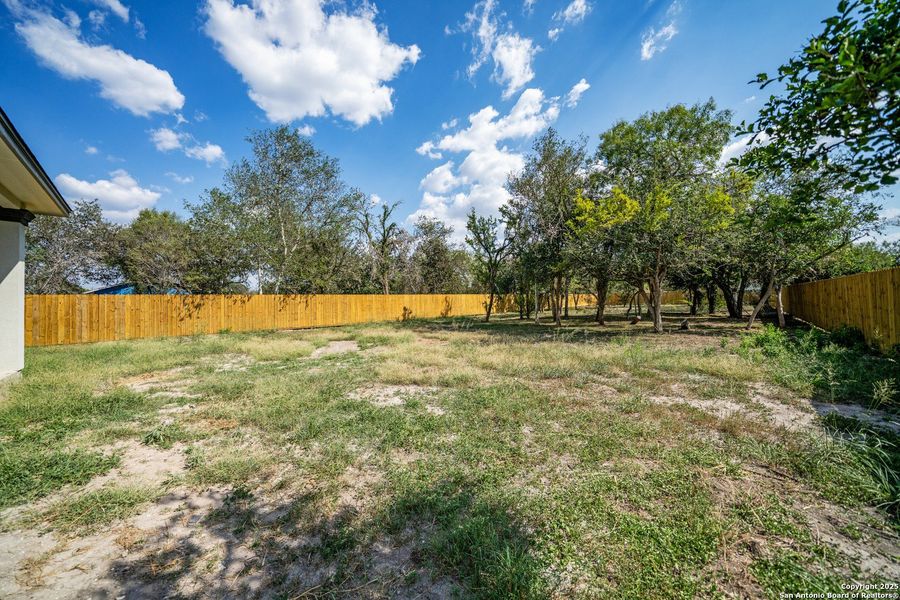 Exterior details and patio area of a home in , Beeville (Image 4).