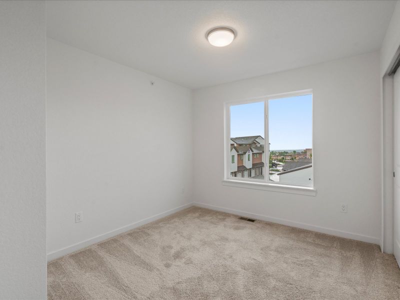 Spacious, unfurnished interior of a new home in The Commons at Victory Ridge, Colorado Springs (Image 8).