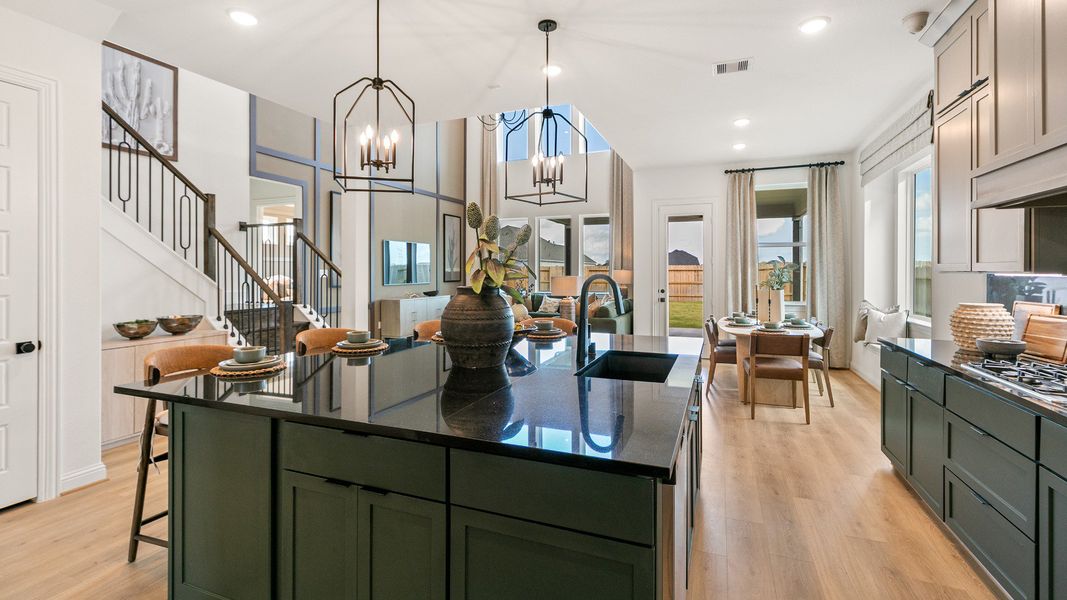 Representative furnished interior of a home built from the Rosewood by Brightland Homes in Sunterra, Katy (Image 10).