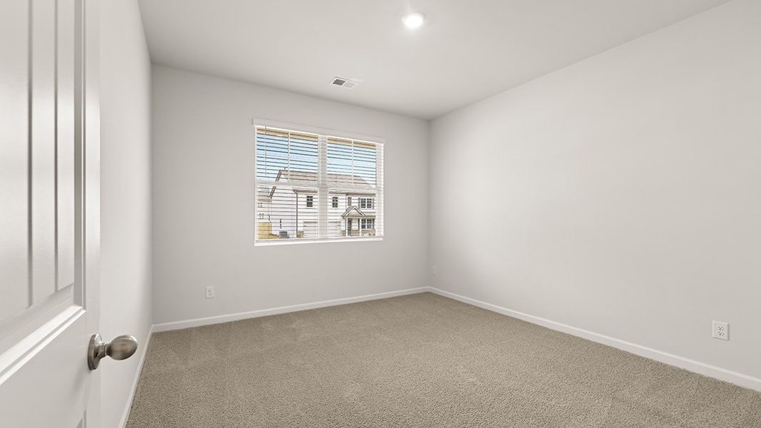Representative unfurnished interior of a home built from the Hanover by D.R. Horton in Thompson Ridge, Dallas (Image 13).