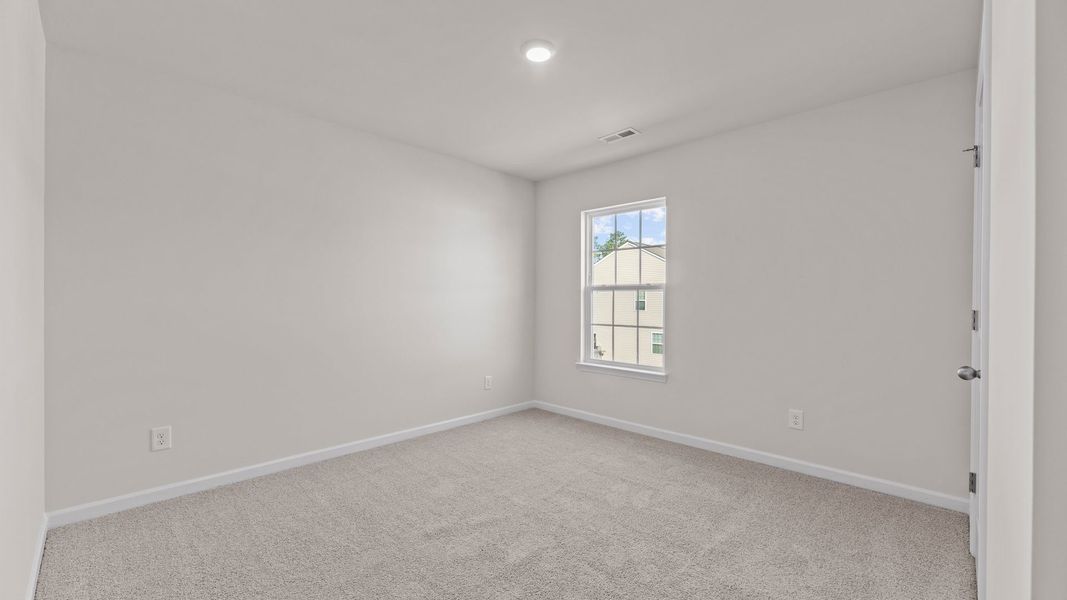 Spacious, unfurnished interior of a new home in East Ridge, Ayden (Image 22).