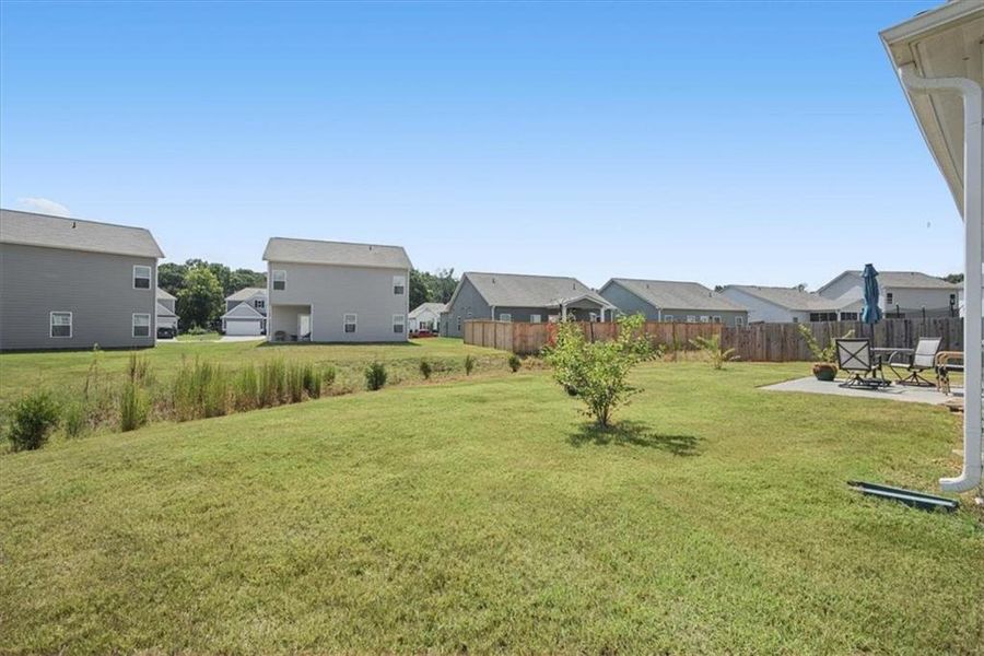 Exterior details and patio area of a home in , Cartersville (Image 28).