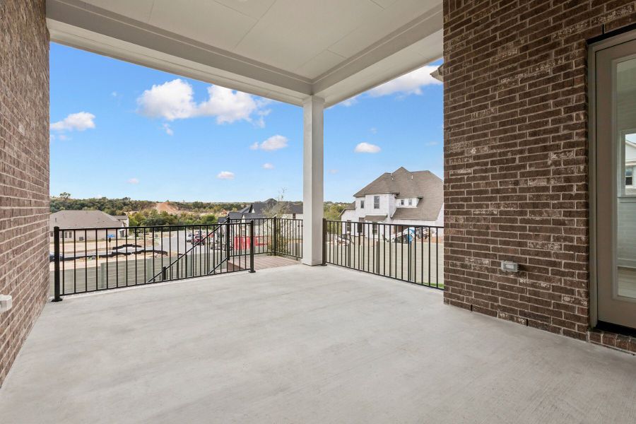 Exterior details and patio area of a home in Wolf Ranch – West Bend, Georgetown (Image 4).