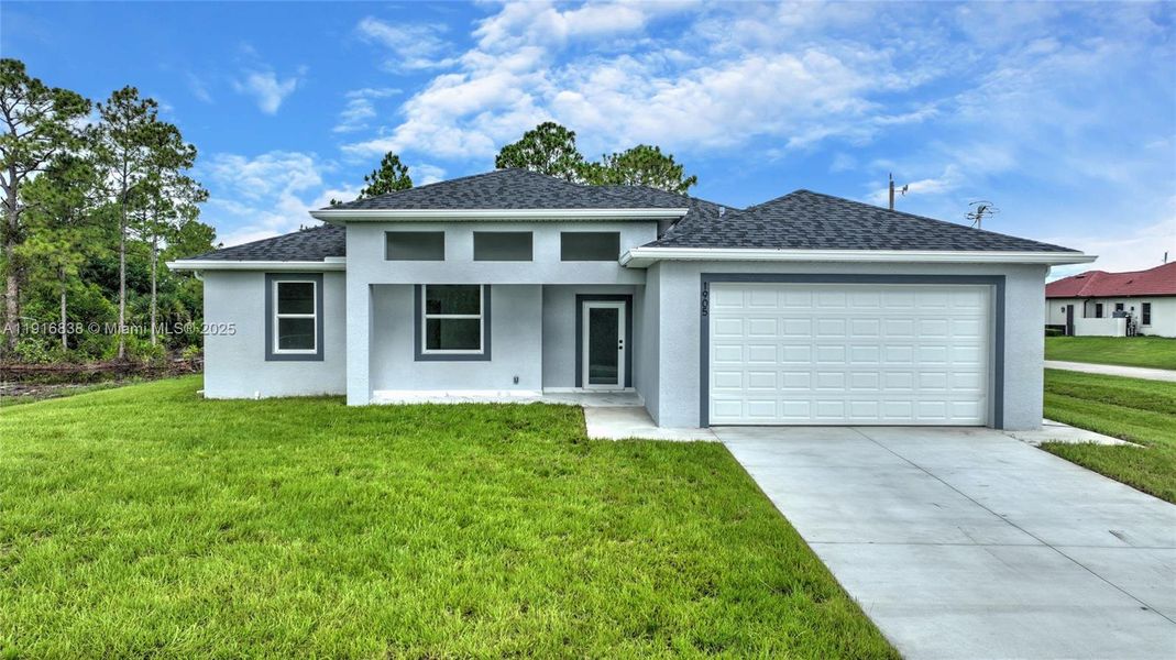 Front exterior of a new home in , Lehigh Acres, FL, highlighting curb appeal (Image 2). Front exterior of a new home in , Lehigh Acres, FL, highlighting curb appeal (Image 2).