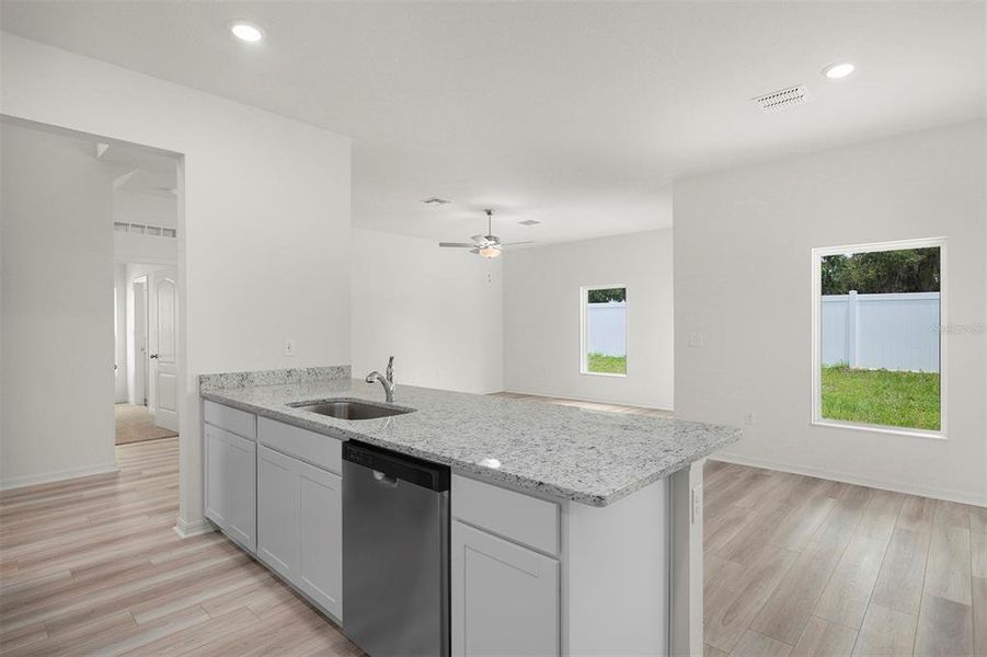 Furnished interior view inside a new home in Tula Parc, Astatula (Image 9).