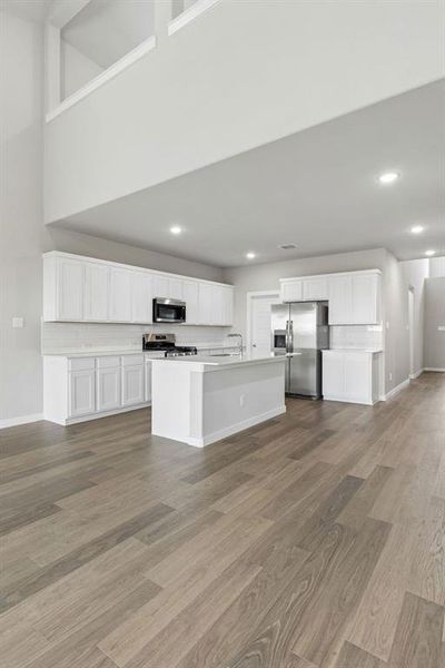 Kitchen in the Winters home plan by Trophy Signature Homes – REPRESENTATIVE PHOTO