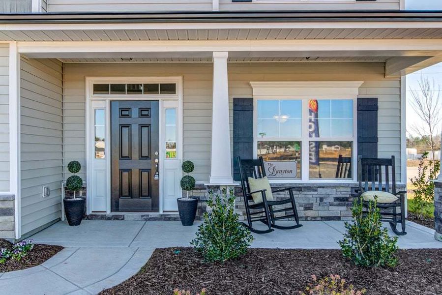 Representative exterior photo of a completed home built from the Drayton by Caviness & Cates Communities in Bartlett Manor, Youngsville, NC (Image 13).