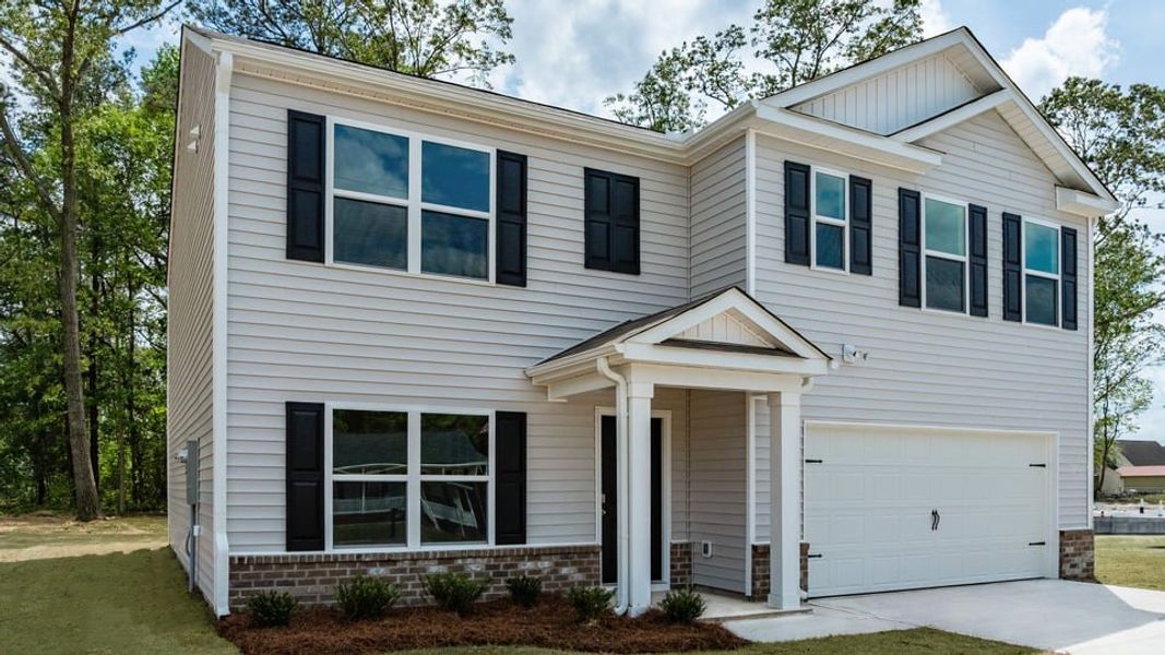 Front exterior of a new home in Bynum Farms, Farmville, NC, highlighting curb appeal (Image 21).