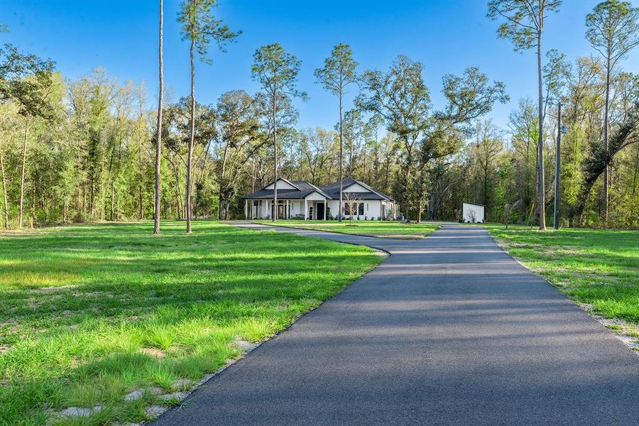 Front exterior of a new home in , High Springs, FL, highlighting curb appeal (Image 24).