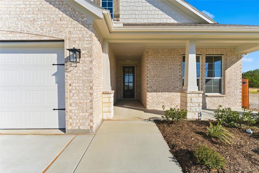 Exterior details and patio area of a home in Waterford Park, Weatherford (Image 29).