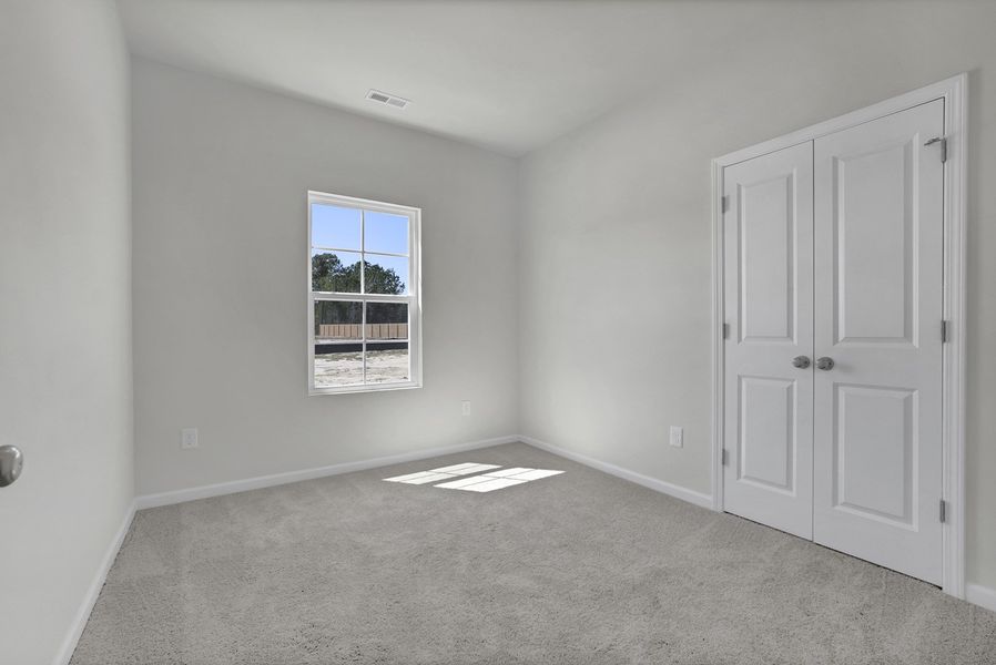 Spacious, unfurnished interior of a new home in River Tide Farms, Bolivia (Image 22).