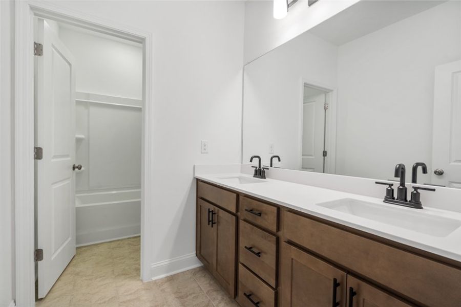 Representative furnished interior of a home built from the Ingram by Taylor Morrison in Falls Creek, Flowery Branch (Image 45).