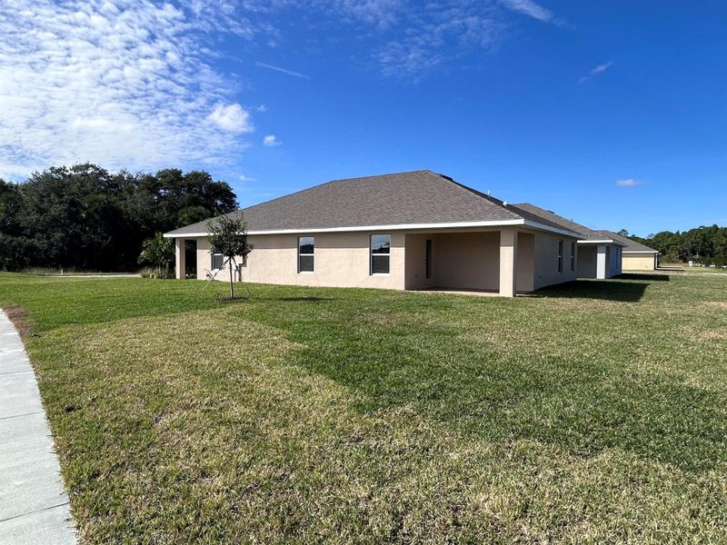 Exterior details and patio area of a home in Waterstone 72, Fort Pierce (Image 4). Exterior details and patio area of a home in Waterstone 72, Fort Pierce (Image 4).