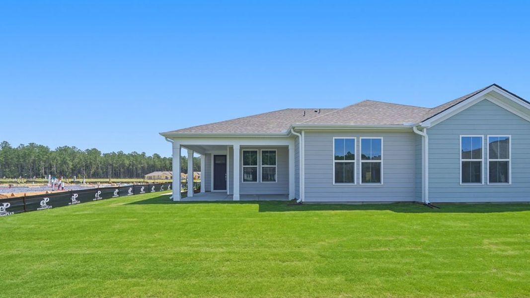 Exterior details and patio area of a home in Sun City Hilton Head, Bluffton (Image 3).