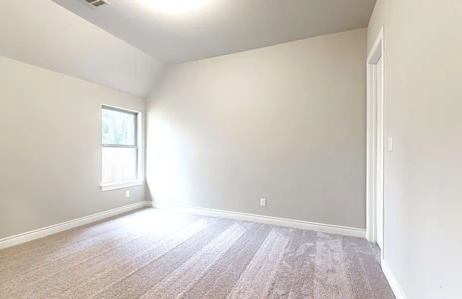 Representative unfurnished interior of a home built from the 3616 by Ravenna Homes in Artavia 70′, Conroe (Image 49).