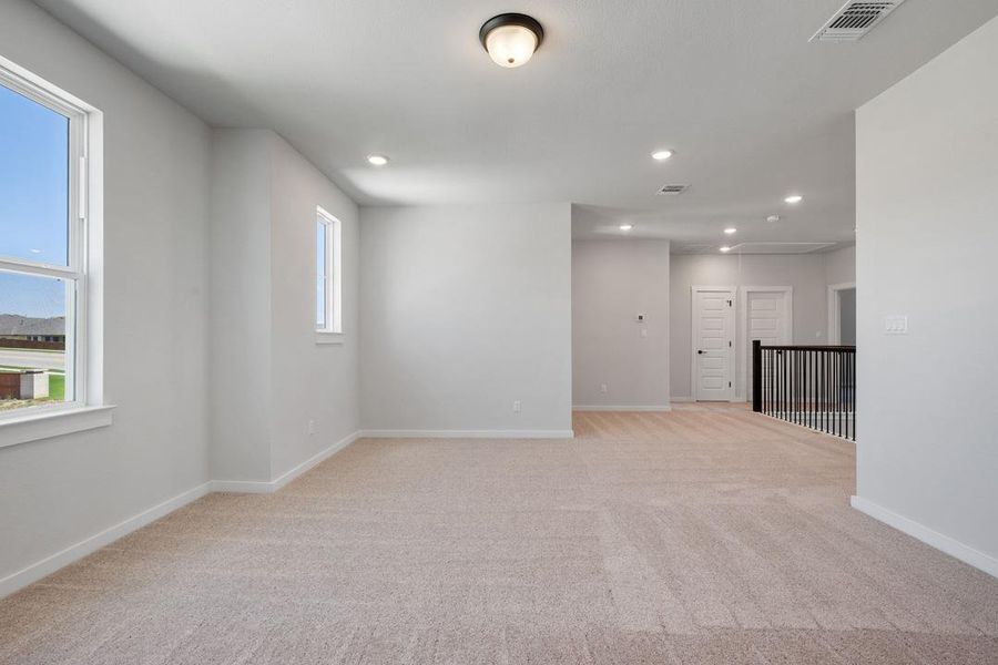 Spacious, unfurnished interior of a new home in Lariat, Liberty Hill (Image 32).