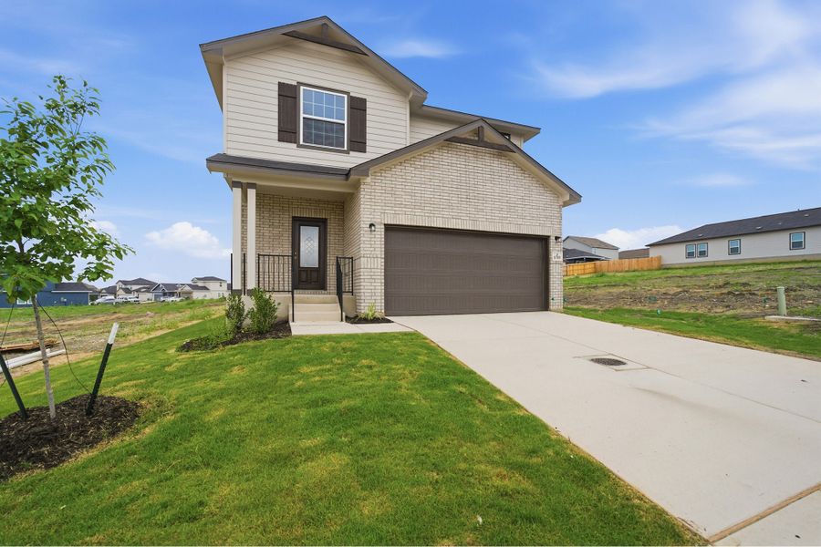 Front exterior of a new home in Willow View, Converse, TX, highlighting curb appeal (Image 2).