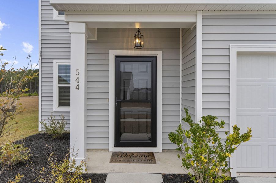 Exterior details and patio area of a home in , Summerville (Image 3).