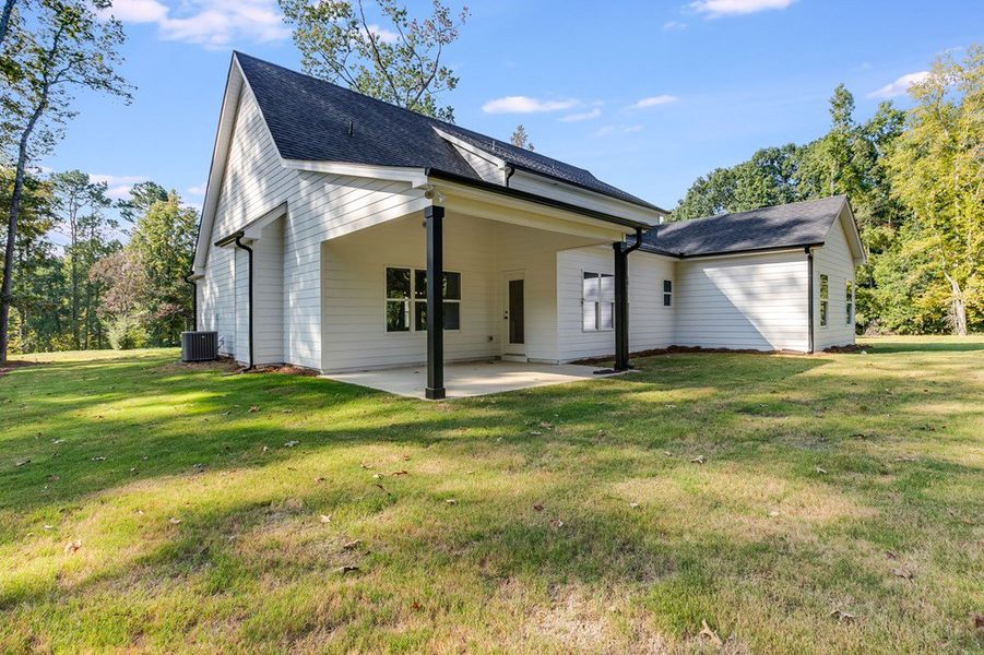 Front exterior of a new home in LOVVORN ESTATES, Carrollton, GA, highlighting curb appeal (Image 27).