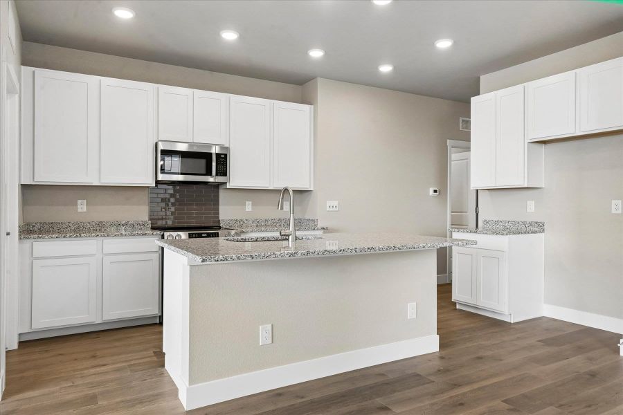 Furnished interior view inside a new home in The Trails at Aspen Ridge, Colorado Springs (Image 5).