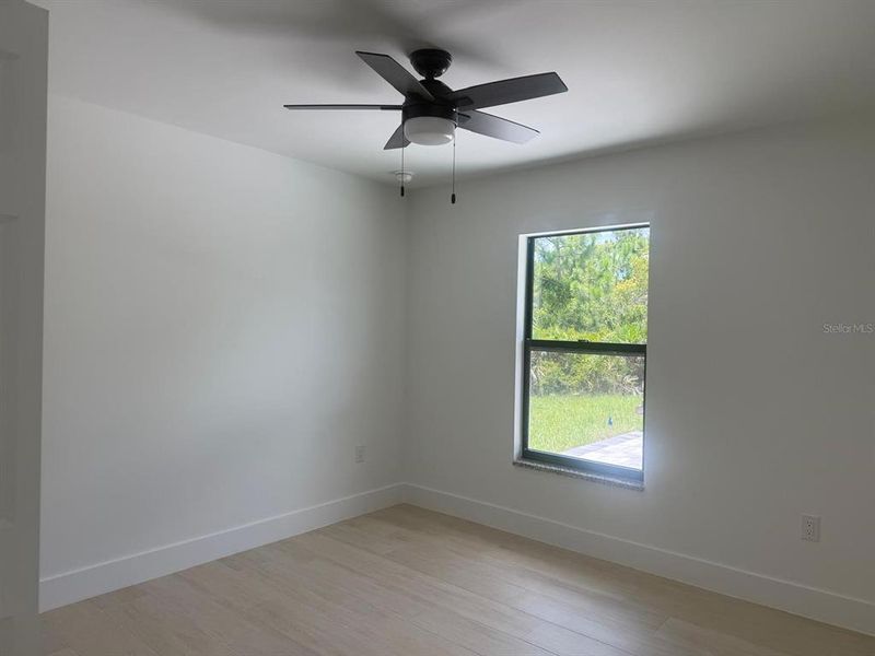 Spacious, unfurnished interior of a new home in , Port Charlotte (Image 8).