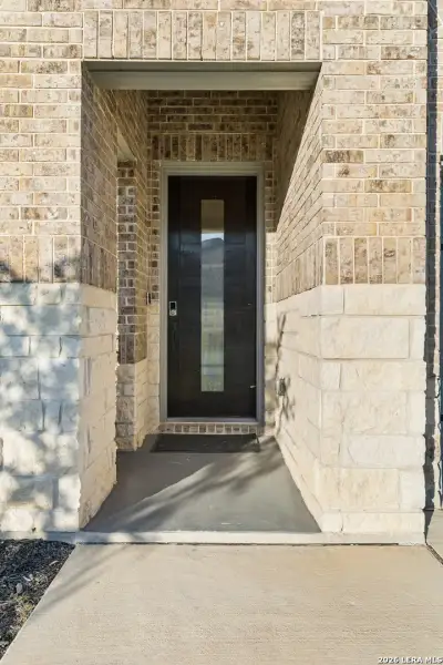 Exterior details and patio area of a home in Autry Pond, San Antonio (Image 30).
