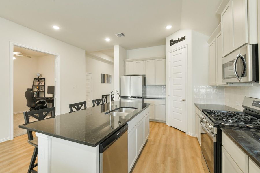 Furnished interior view inside a new home in Oakwood Estates, Waller (Image 5).