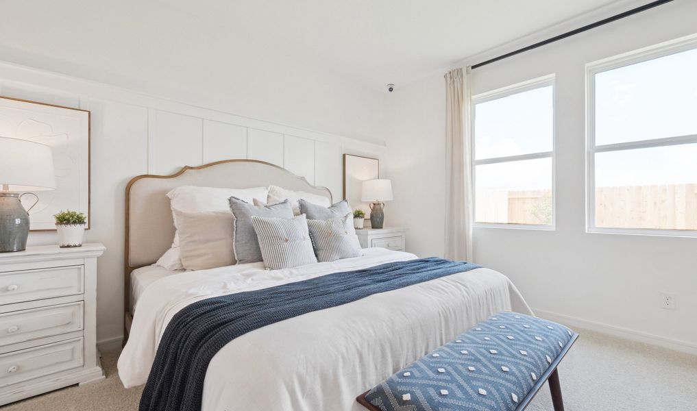 Primary suite with decorated feature wall