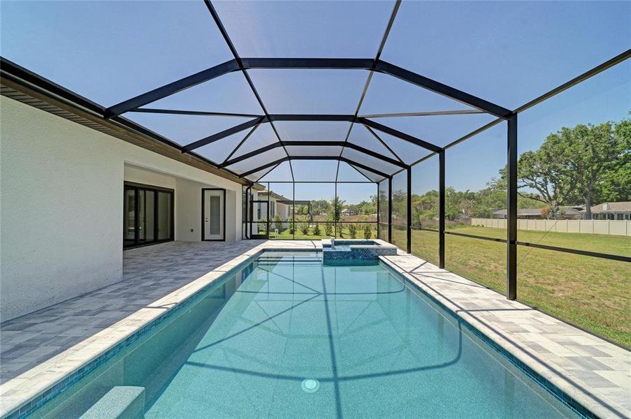 Exterior details and patio area of a home in Hidden Lakes, Brandon (Image 23).