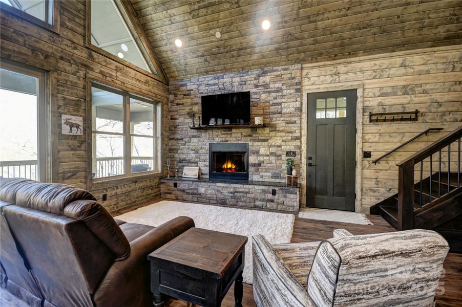 Living Area of the great room with a propane log fireplace (simulated flames)