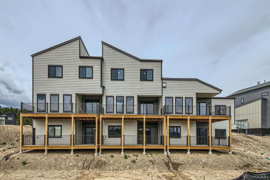 Front exterior of a new home in , Tabernash, CO, highlighting curb appeal (Image 18).