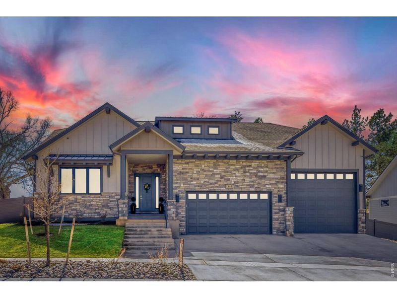 Front exterior of a new home in , Berthoud, CO, highlighting curb appeal (Image 27).