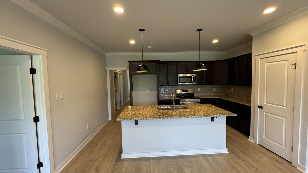 Furnished interior view inside a new home in The Greens at Legacy Townhomes, Springfield (Image 6). Furnished interior view inside a new home in The Greens at Legacy Townhomes, Springfield (Image 6).