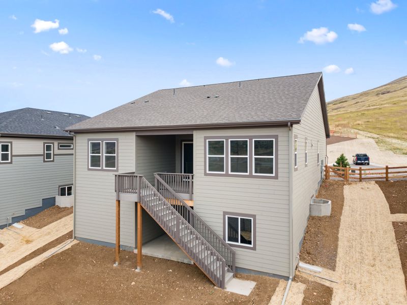 Exterior details and patio area of a home in The Manors Collection at Golden Overlook, Lakewood (Image 3).