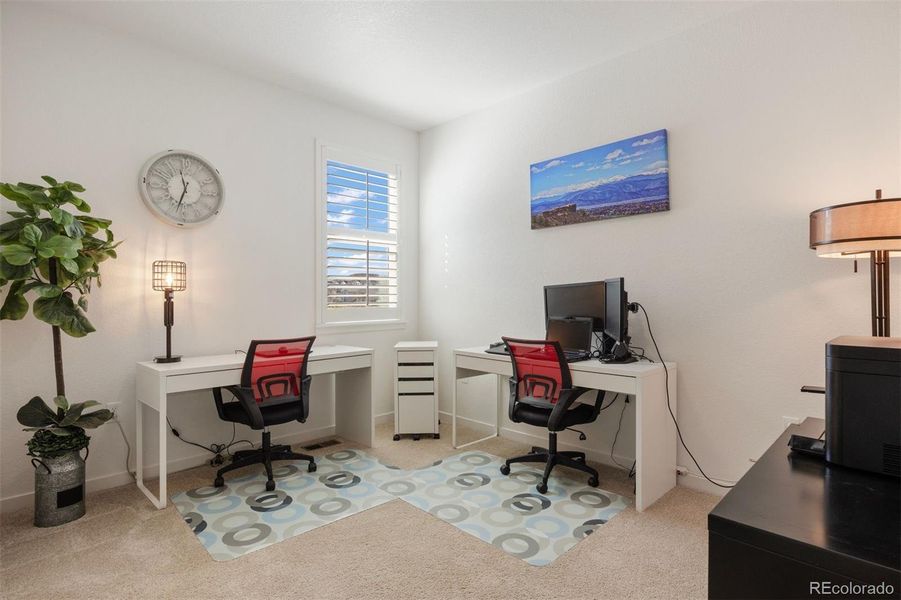 Third secondary bedroom, flexible space ideal for a home office, study, or creative nook.