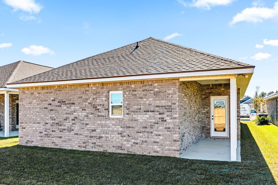 Exterior details and patio area of a home in Natureview, Freeport (Image 3). Exterior details and patio area of a home in Natureview, Freeport (Image 3).