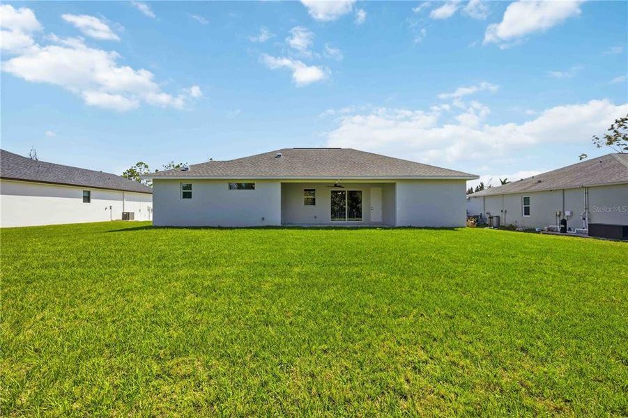 Exterior details and patio area of a home in , Port Charlotte (Image 32).